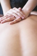 massage deep back muscles along spine.